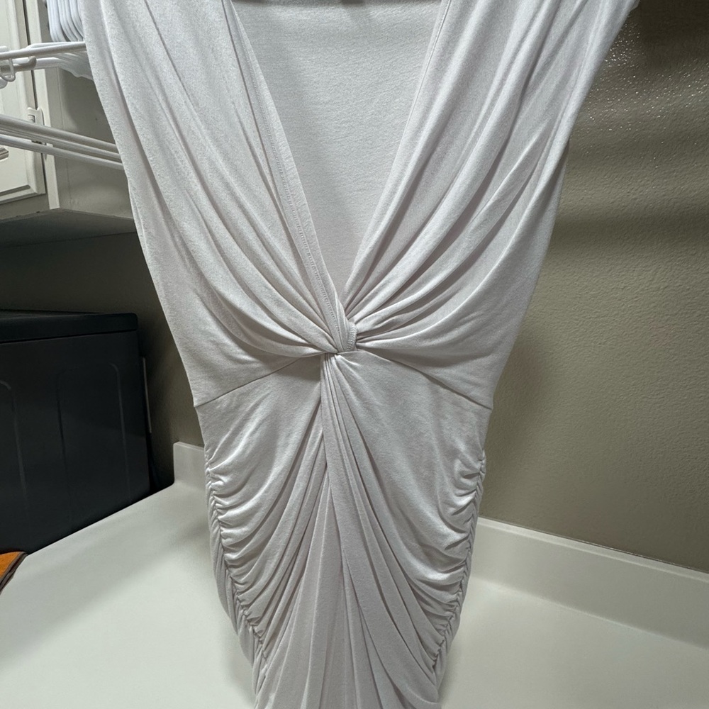 Elegant White Draped Dress, used once. 2 minor tears to back of neck area.